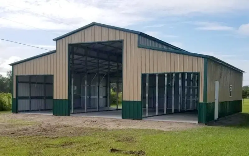 Custom metal barn with green trim